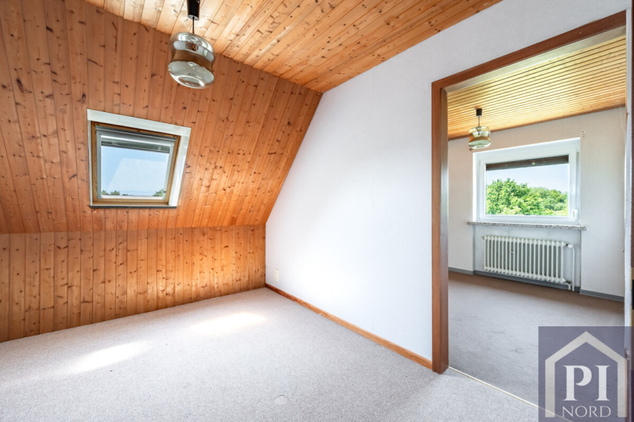 Zwei Zimmer mit Feld- und Gartenblick