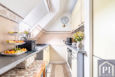 Funktionale Küche im DG - Appartement