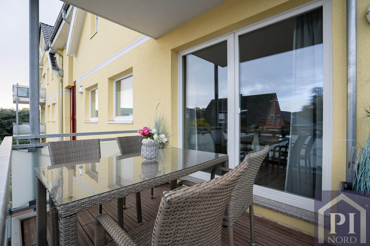 Überdachter Balkon mit Glasumrandung