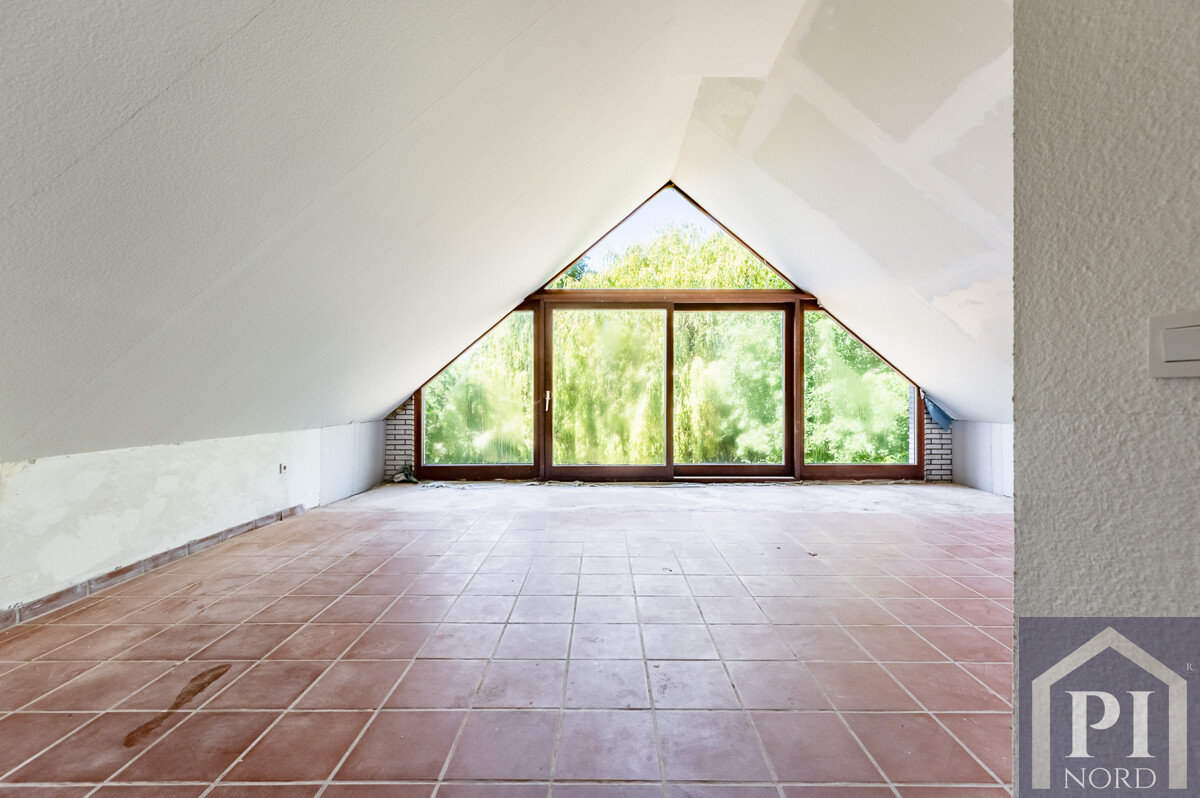 Wohnzimmer mit Glasgiebel