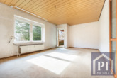 Wohnzimmer in Südausrichtung mit Balkon