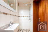 Modernisiertes Gäste WC mit bodengleicher Dusche